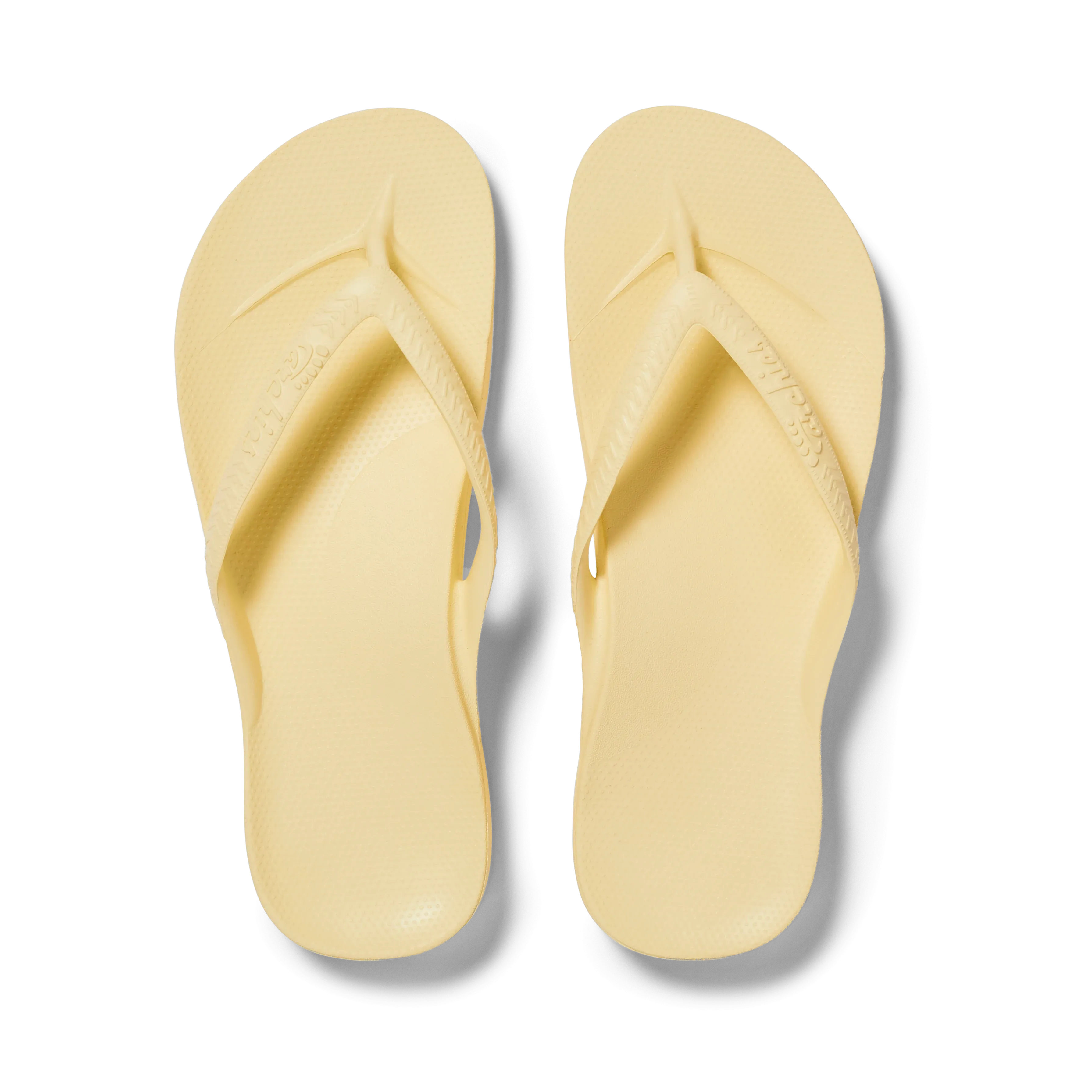 Arch support flip flops in lemon