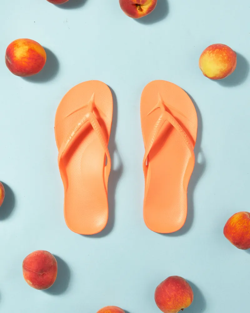 Arch support flip flops in peach