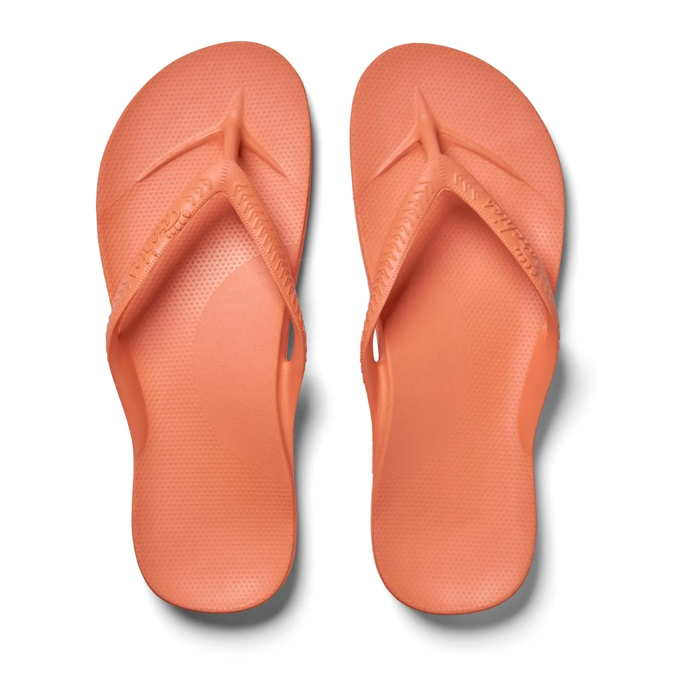 Arch support flip flops in peach